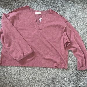 Pink/mauve long sleeve top.